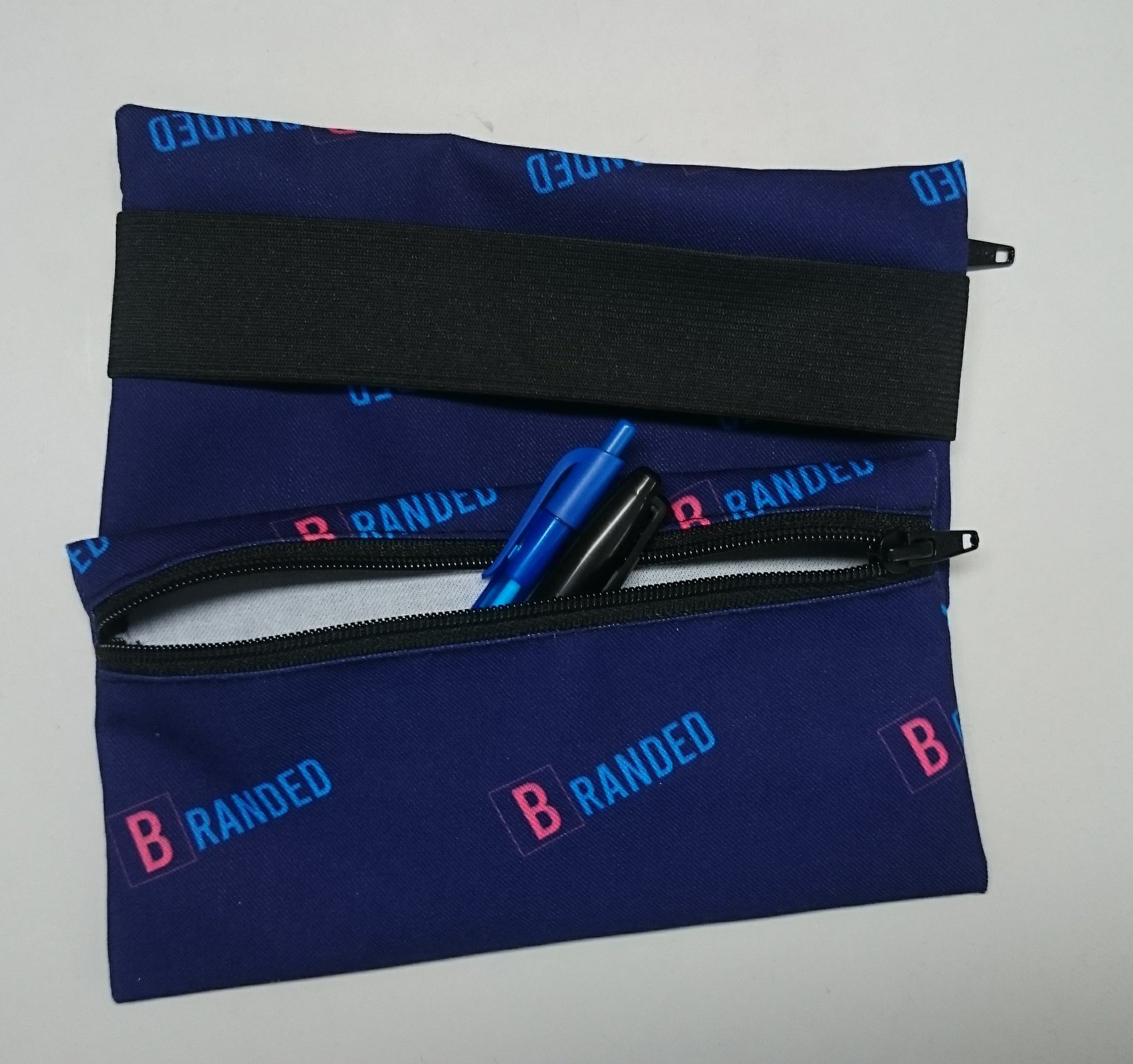 Sublimated 8 1/4" x 4" zippered pencil case with elastic